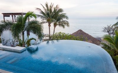 Unwind by Crystal Clear Waters at a Poolside Resort in Honolulu, HI for Your Next Getaway